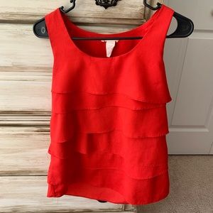 Red sleeveless top with ruffles